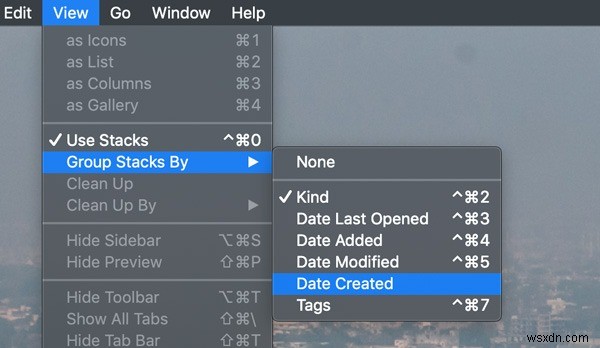 साफ़ डेस्कटॉप के लिए macOS पर स्टैक्स सक्षम करें